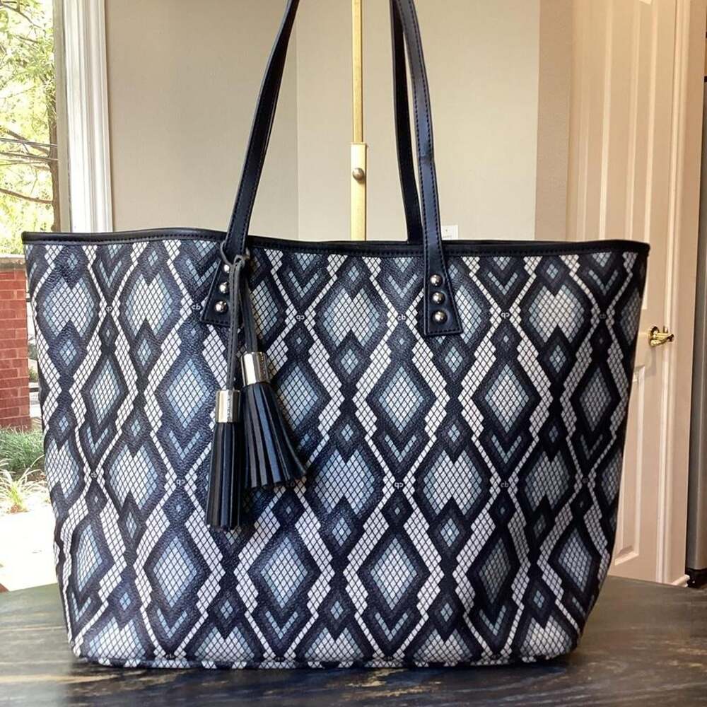 Cinda B White And Navy Blue Diamond Snake pattern tote bag with tassels